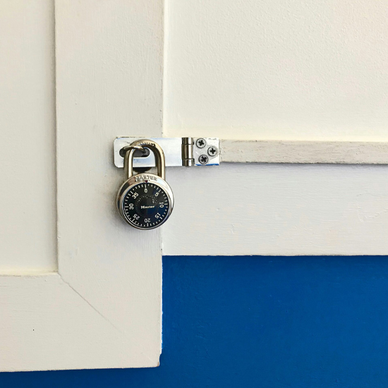 Dev Tech Solutions | an image showing an old school lock on a door